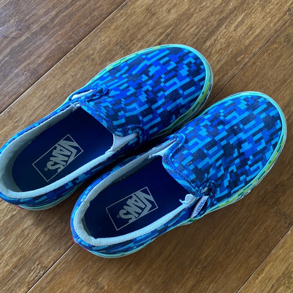 Blue Vans slip on sneaker shoes